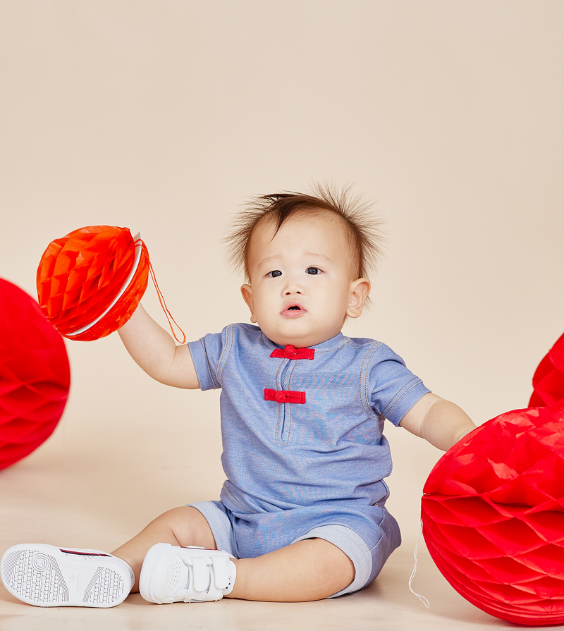 Baby Boy Wearing OETEO CNY Modern Blessings Baby Polo Tee