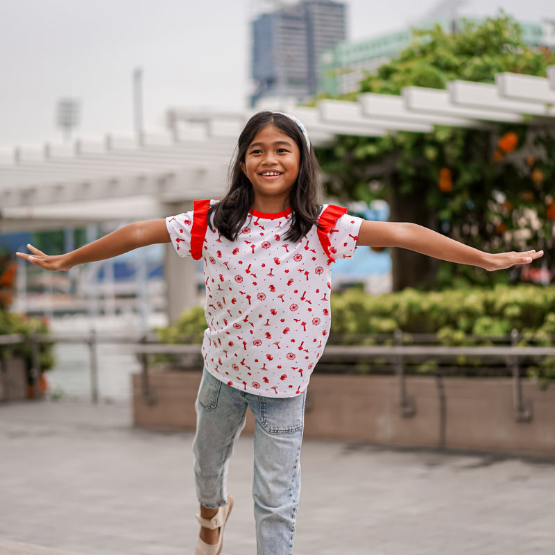 Girl Wearing OETEO Heritage Singapore Icons Kid Girl’s Tee