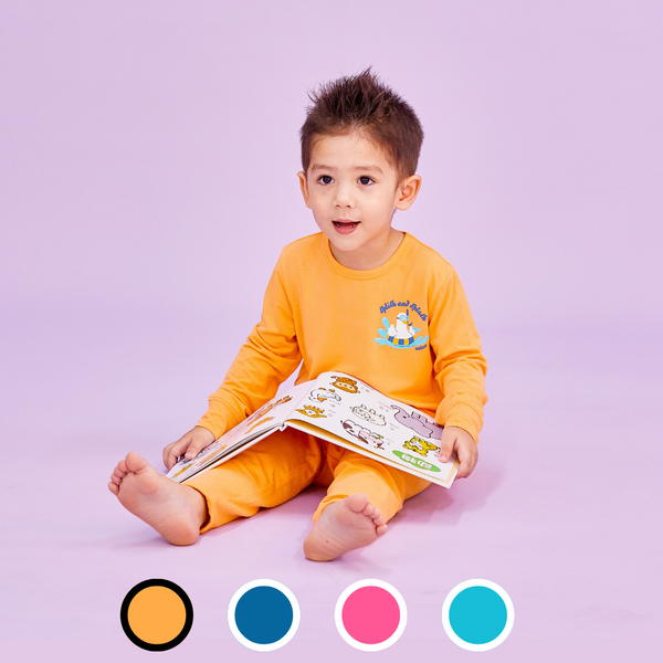 Boy Wearing OETEO Duckie's Day Off Bamboo Toddler Jammies (Orange) 