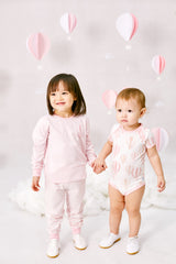 A baby boy and girl Dressed Love From Above Baby Romper (Pink) | Oeteo Singapore