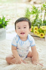 A baby boy dressed Love From Above Baby Romper (Blue) | Oeteo Singapore