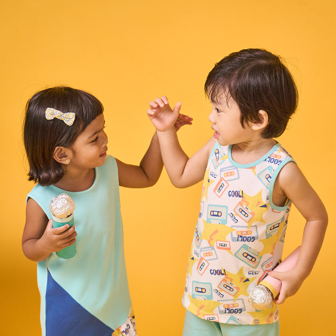 A boy and a girl dressed Mixtape Colourblock Girl Dress | Oeteo Singapore